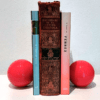 Suporte de Livros com bola de vidro soprado com técnica de Murano na cor vermelha.