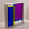 Escultura Módulo de acrílico série Android #11, coleção Romildo Silva Fº. Elaborado em acrílico translúcido roxo, azul claro, azul escuro e amarelo. Moldura em acrílico branco.